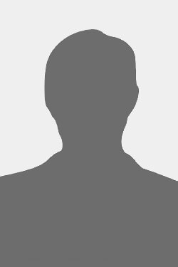 Grey silhouette of a person against a lighter gray background.