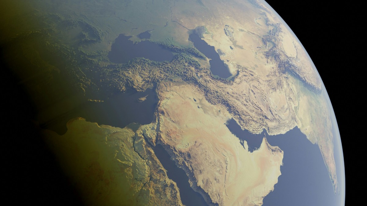 View of Earths Middle East region from space, showing countries like Saudi Arabia and Iran, with visible desert landscapes and surrounding seas under sunlight.